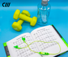 Candywires Neon Wireless earbuds pictured with weights. Ready to workout with these headphones